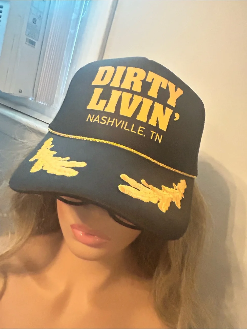 Dirty Livin' Nashville Trucker Hat black & Gold  yellow tinted glasses